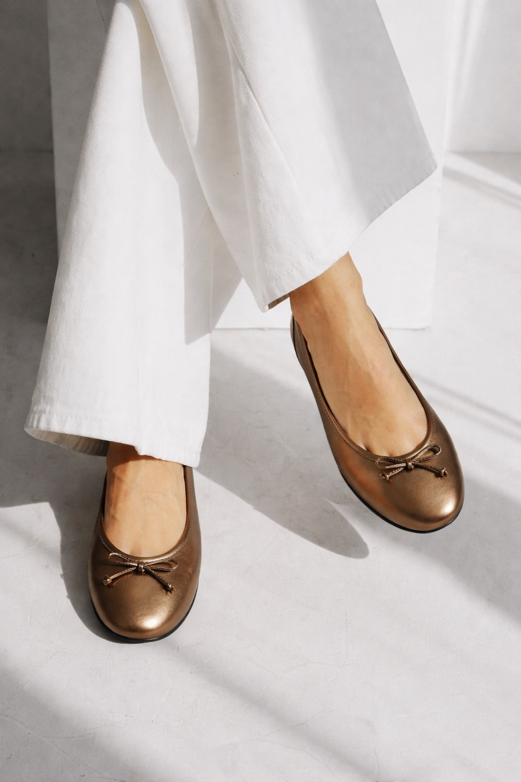 Elegantne baletanke u bronzanoj nijansi kože